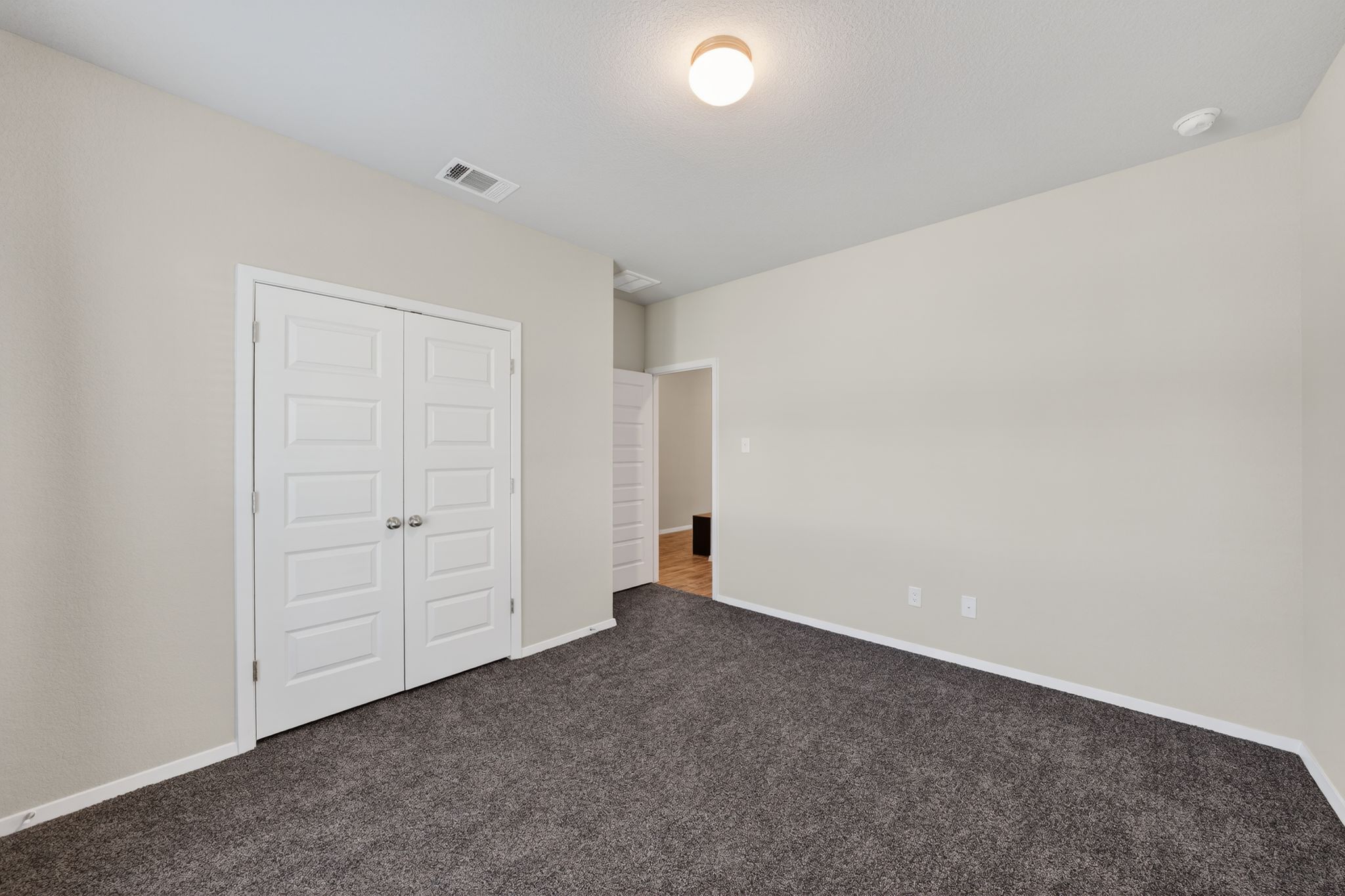 20703 Ridgeview Road Lago Vista, TX 78645 - Photo 22 of 30 an empty room with an entryway