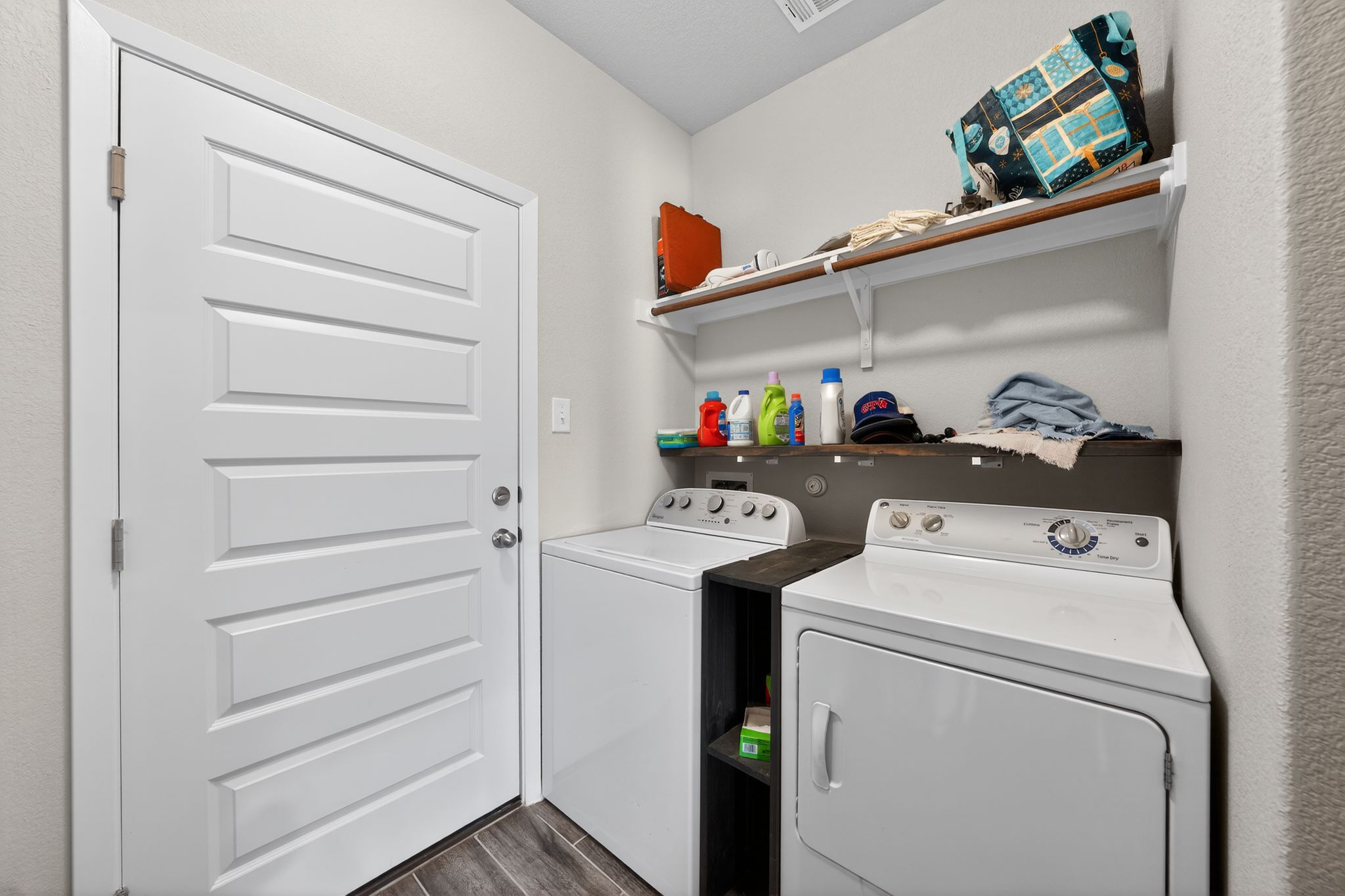 20703 Ridgeview Road Lago Vista, TX 78645 - Photo 30 of 30 a utility room with dryer and washer