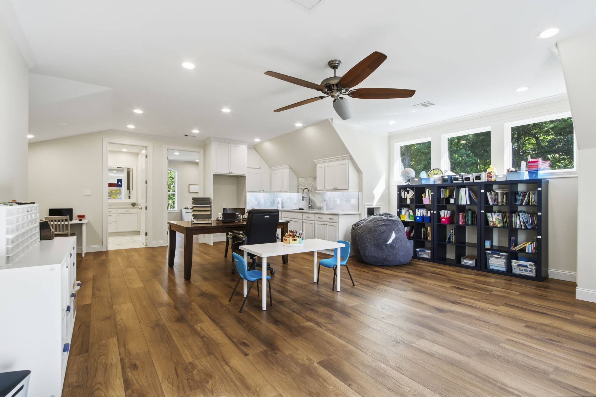 36702 Deer Valley Magnolia, TX 77355 - Photo 25 of 46 a living room with furniture and a wooden floor