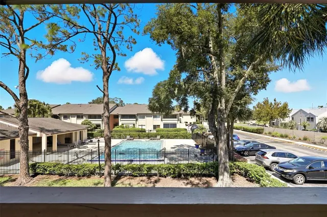 a front view of house and yard with green space
