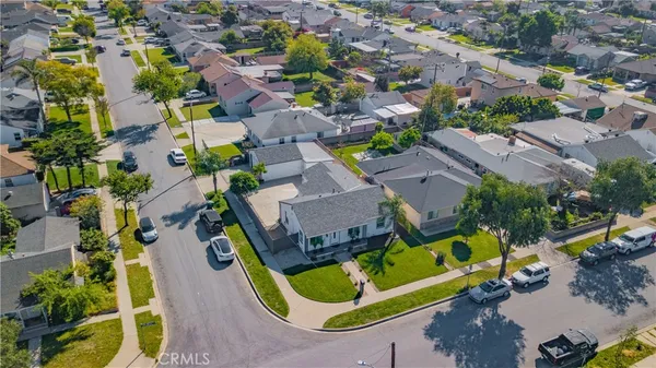 an aerial view of residential house with swimming pool