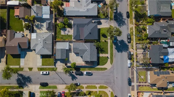 an aerial view of houses with outdoor space