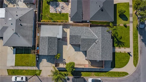 an aerial view of multiple houses with outdoor space