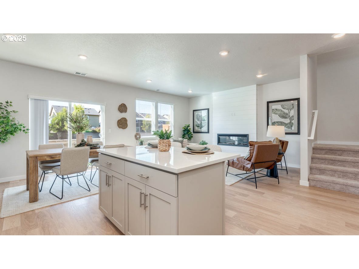 2150 36th Avenue Forest Grove, OR 97116 - Photo 11 of 24 a kitchen with a sink cabinets and wooden floor