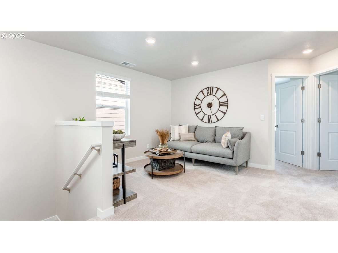2150 36th Avenue Forest Grove, OR 97116 - Photo 12 of 24 a living room with furniture and a large window
