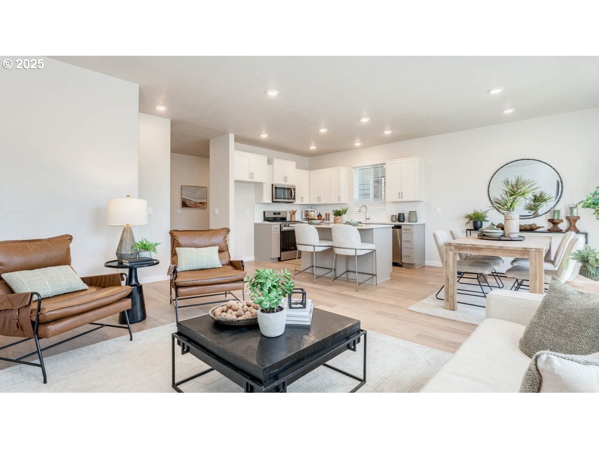 2150 36th Avenue Forest Grove, OR 97116 - Photo 7 of 24 a living room with furniture and view of kitchen