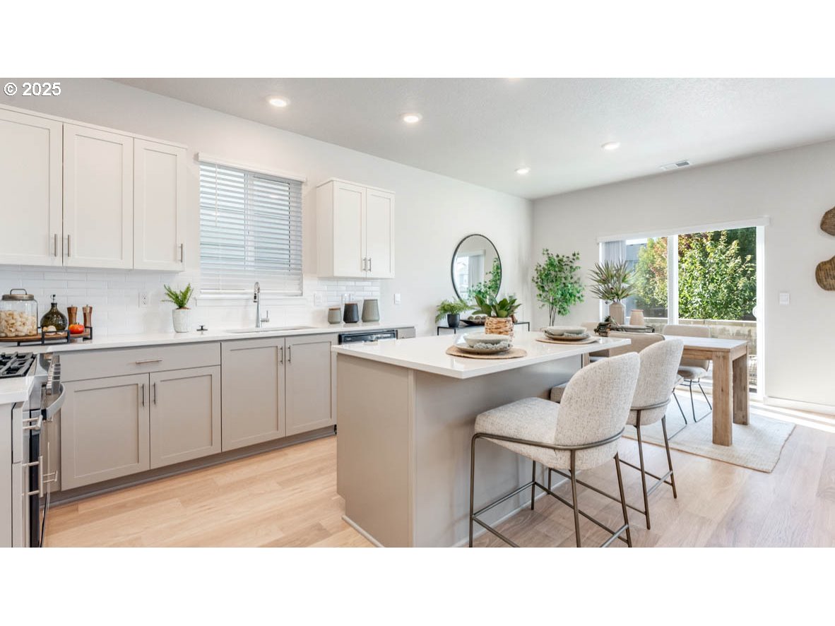 2150 36th Avenue Forest Grove, OR 97116 - Photo 10 of 24 a kitchen with a sink cabinets and window