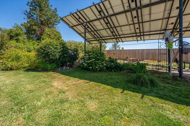 a view of a lake with a house in the background