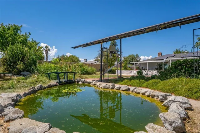 a backyard of a house with lots of green space