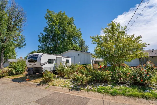 an aerial view of a building with ocean view