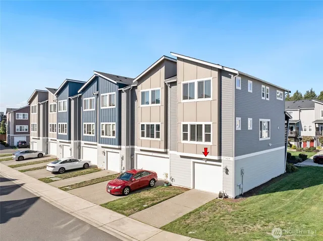 a front view of a house with yard