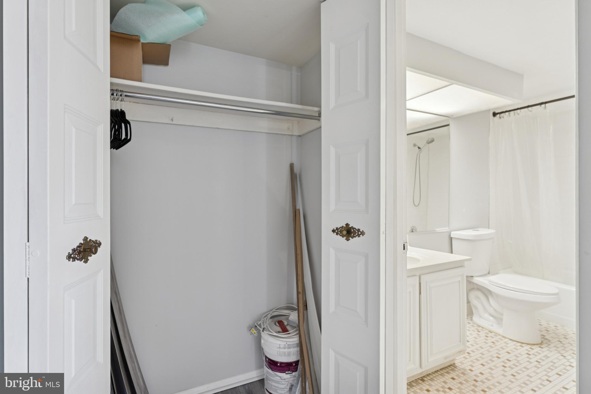 6100 Westchester Park Drive, Unit 520 College Park, MD 20740 - Photo 13 of 15 a bathroom with a toilet and a shower