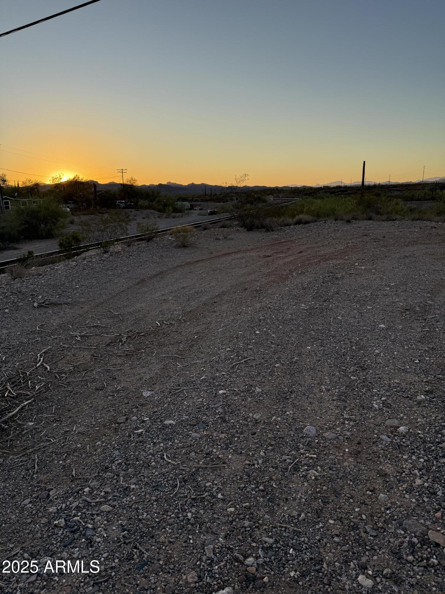 26-xxx West Gates Road Morristown, AZ 85342 - Photo 5 of 7 a view of a field with an ocean