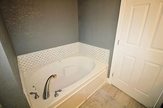 a bathroom with a bathtub