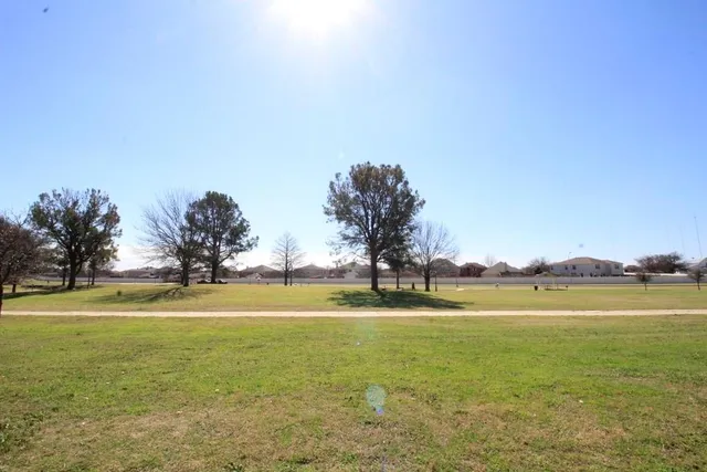 a view of a lake with a big yard