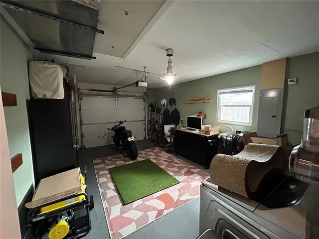 a room with furniture and a rug