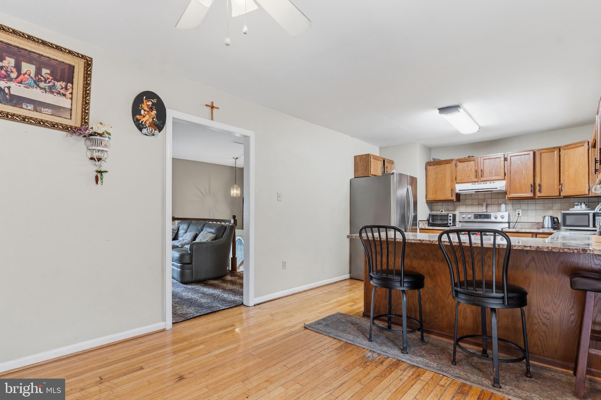 12574 Bristow Road Nokesville, VA 20181 - Photo 17 of 38 a view of a room with furniture and wooden floor