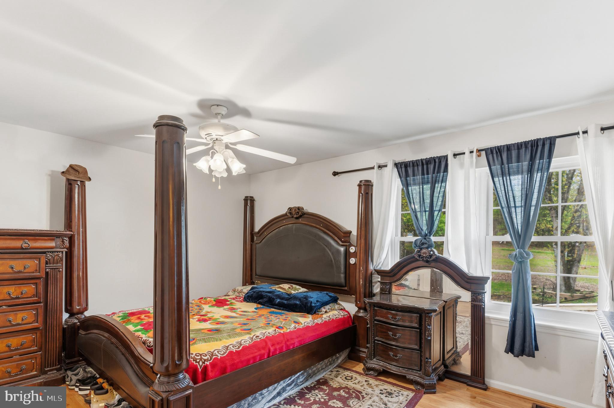 12574 Bristow Road Nokesville, VA 20181 - Photo 18 of 38 a bedroom with furniture and large window