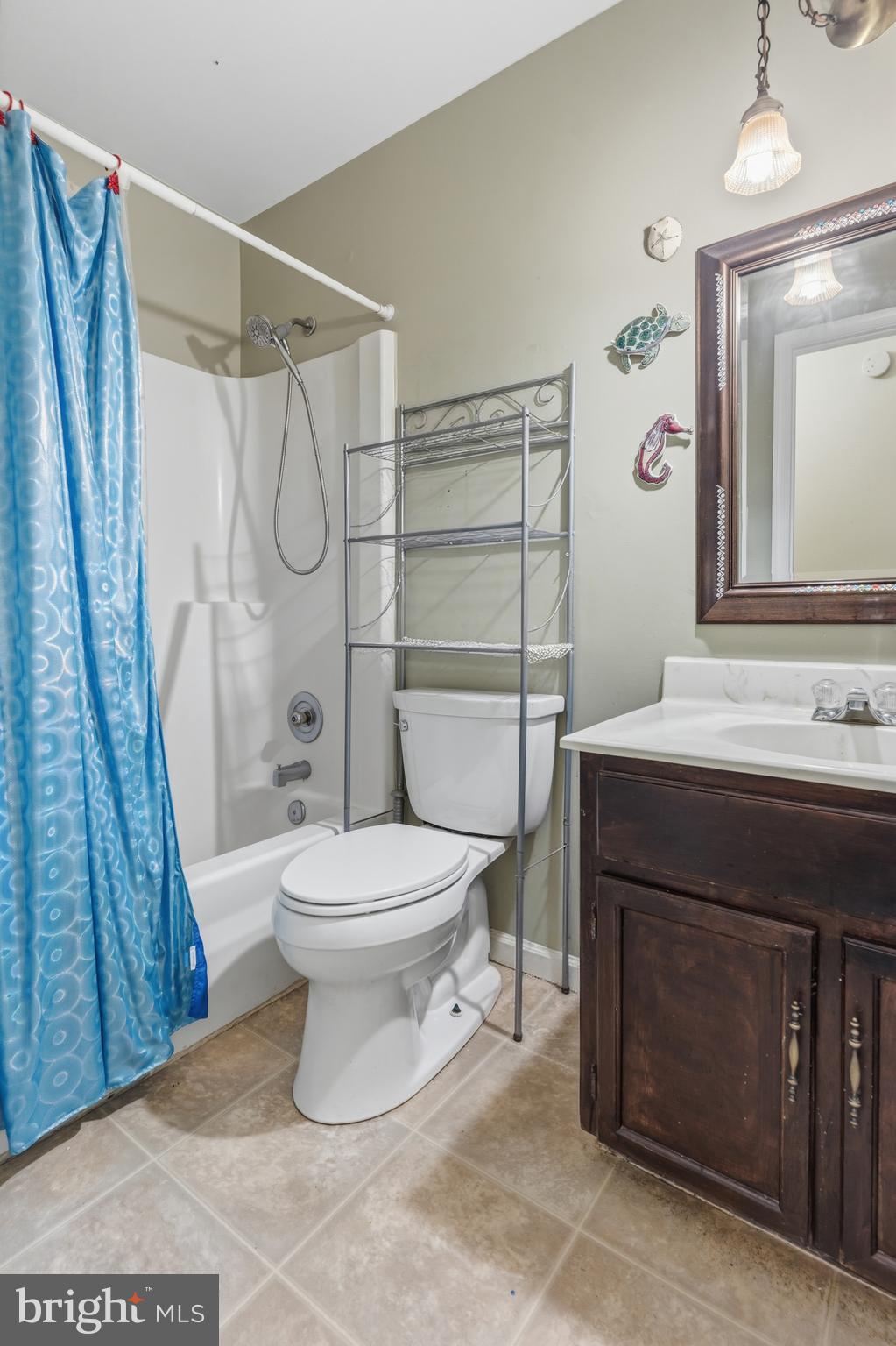 12574 Bristow Road Nokesville, VA 20181 - Photo 23 of 38 a bathroom with a toilet a sink and a shower