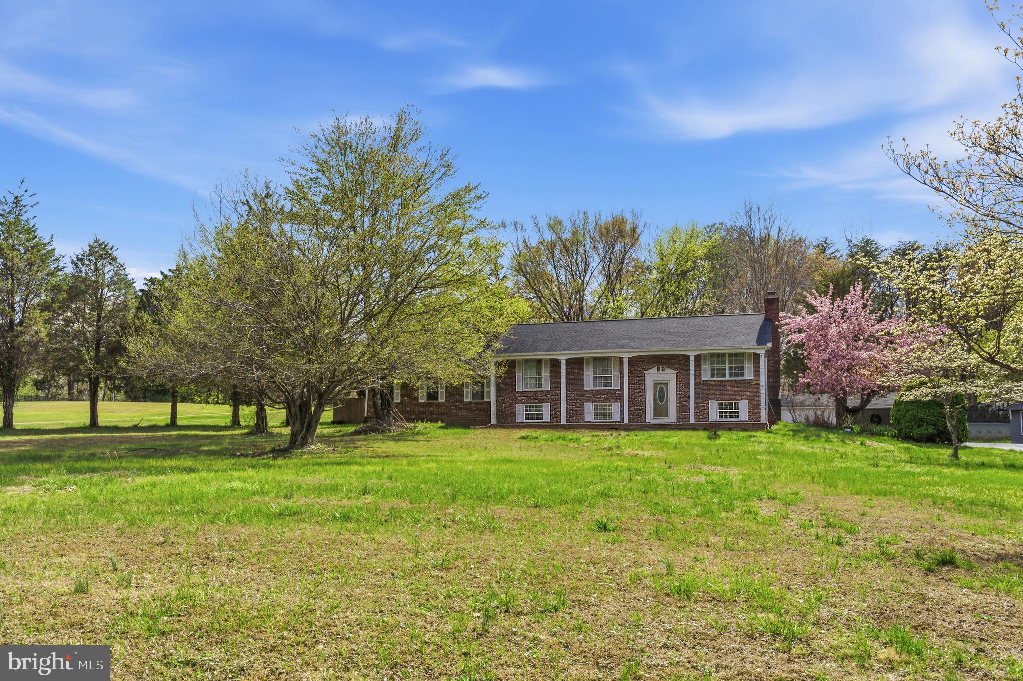 12574 Bristow Road Nokesville, VA 20181 - Photo 3 of 38 a view of a house with a yard