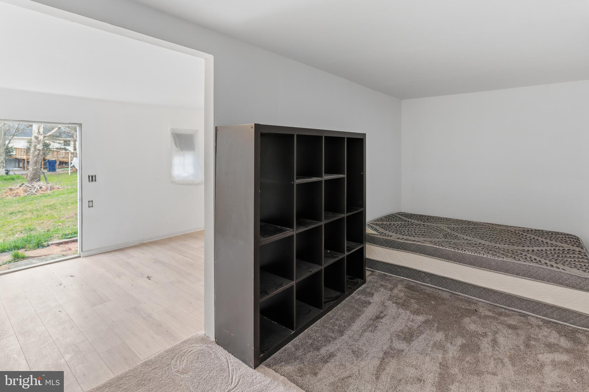 12574 Bristow Road Nokesville, VA 20181 - Photo 38 of 38 a view of closet area with empty racks
