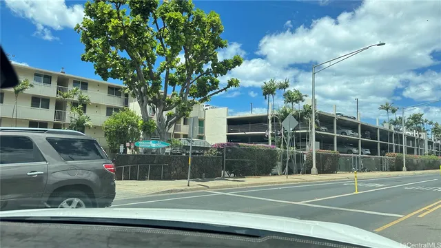 a view of a chairs and table in a patio