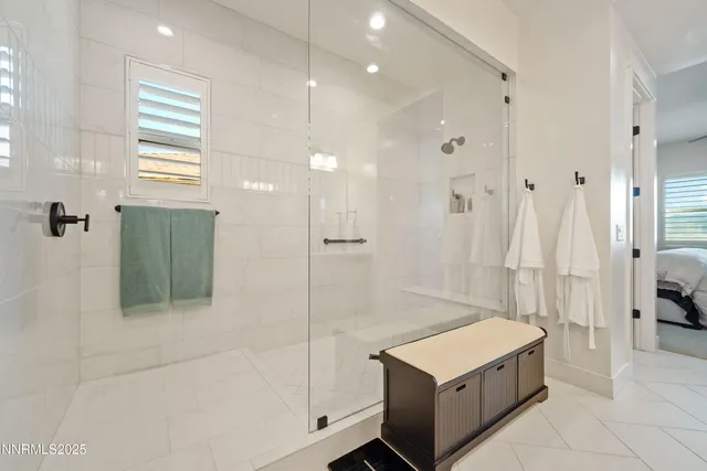 a view of a dining room with furniture and window