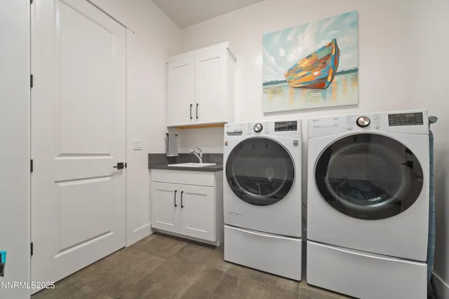 a bathroom with 2 sink tub and a mirror
