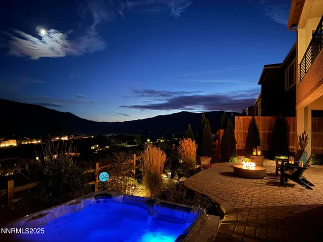 a view of a chairs and tables in the patio