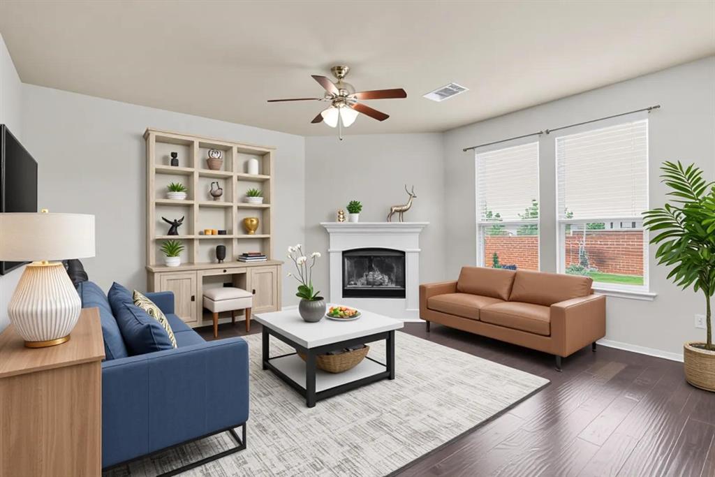 2114 Cedar Trail Anna, TX 75409 - Photo 1 of 34 a living room with furniture and a fireplace