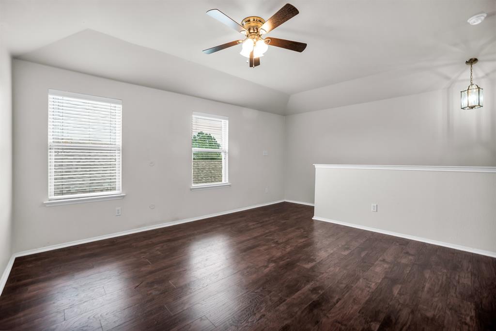 2114 Cedar Trail Anna, TX 75409 - Photo 20 of 34 wooden floor in an empty room with a window