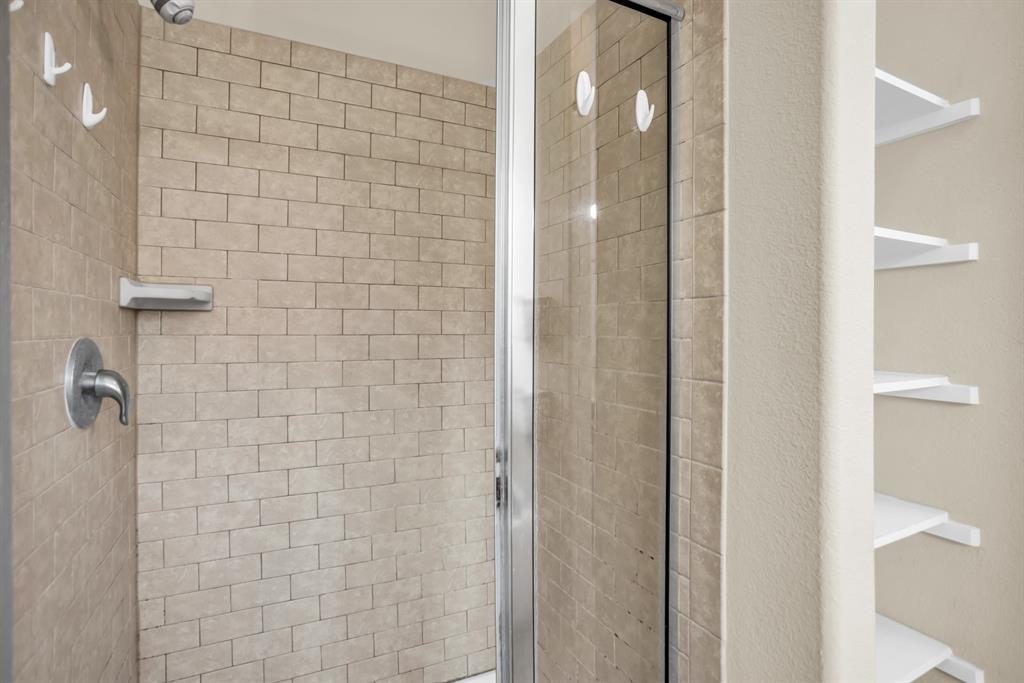 2114 Cedar Trail Anna, TX 75409 - Photo 29 of 34 a bathroom with a shower