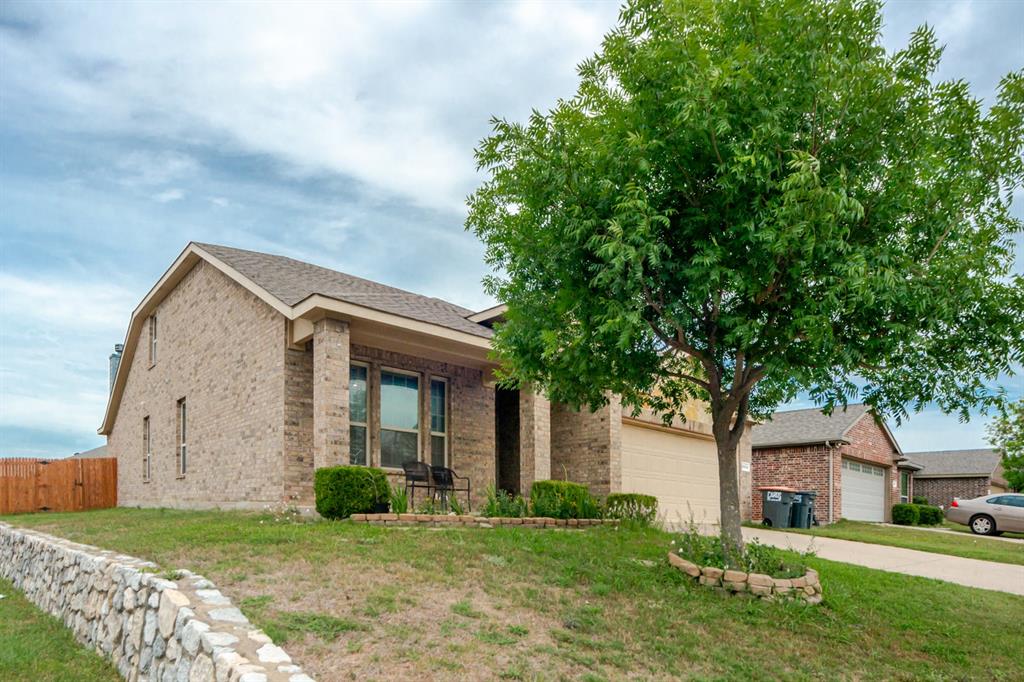 2114 Cedar Trail Anna, TX 75409 - Photo 4 of 34 a front view of a house with garden