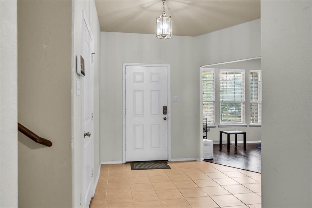 2114 Cedar Trail Anna, TX 75409 - Photo 7 of 34 a view of a livingroom with a staircase