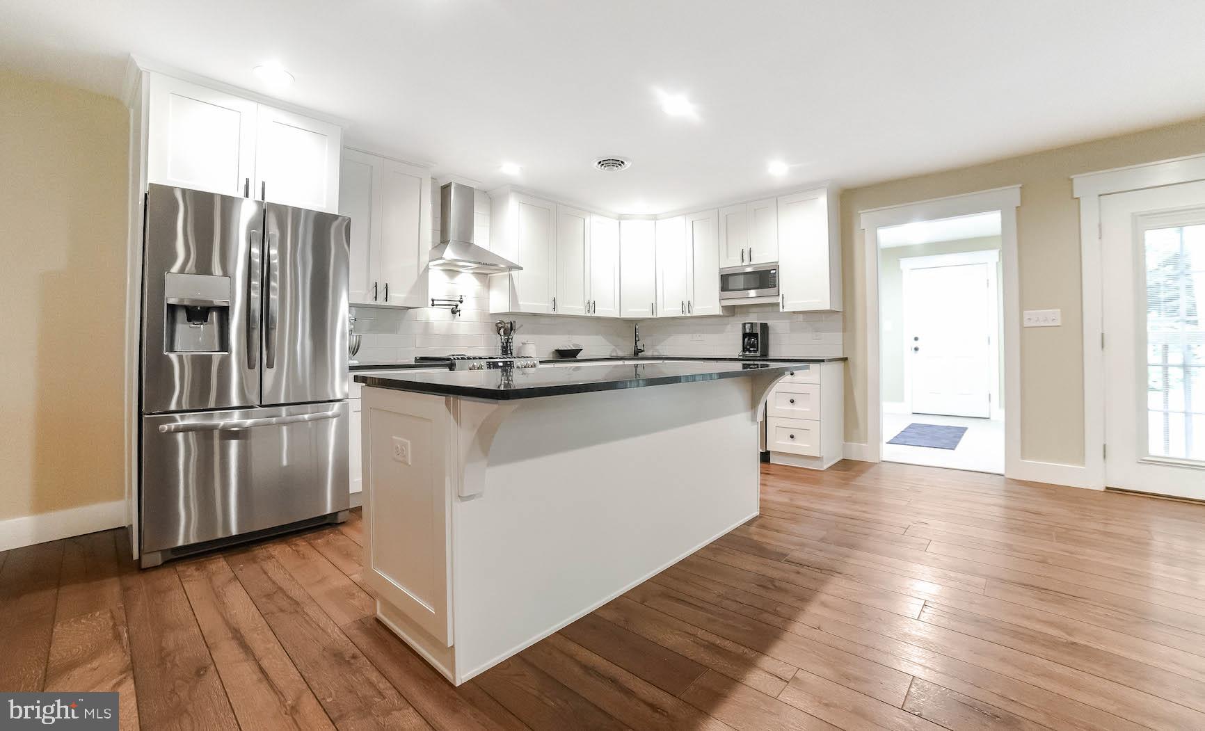 44415 Tall Timbers Road Tall Timbers, MD 20690 - Photo 31 of 74 Kitchen is open to Family Room
