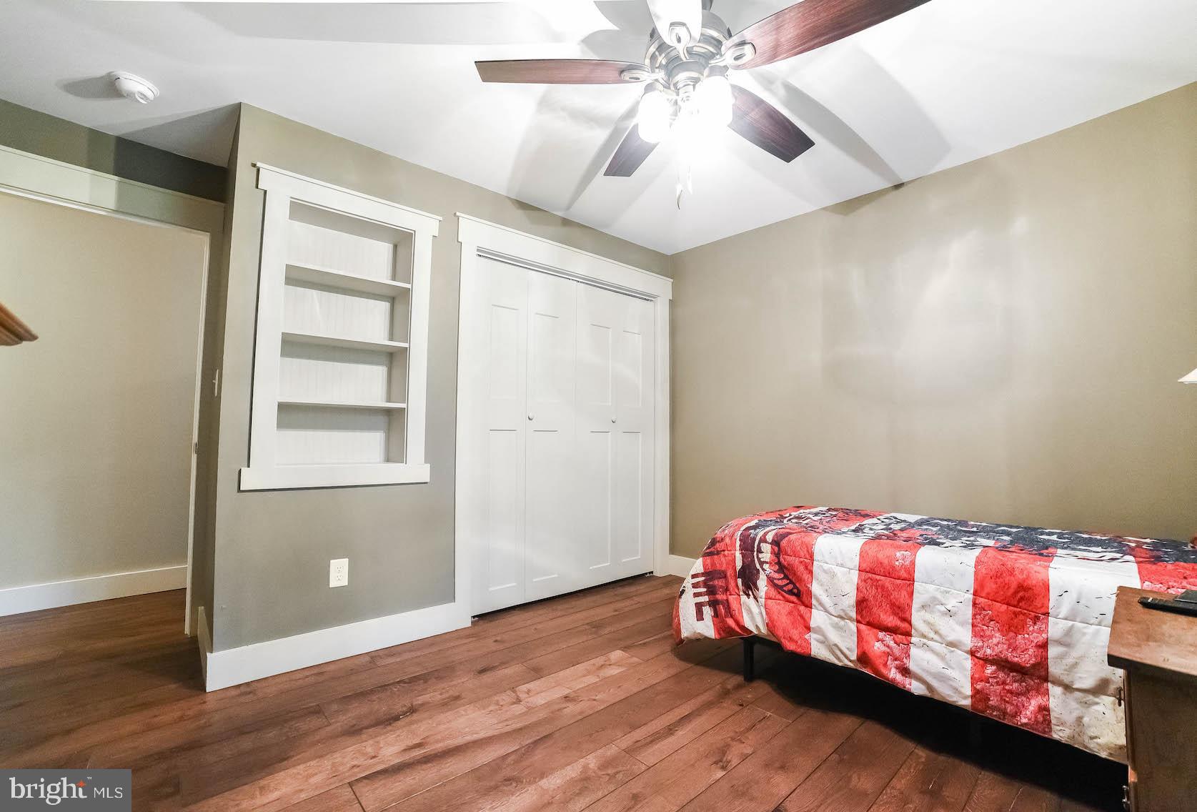 44415 Tall Timbers Road Tall Timbers, MD 20690 - Photo 62 of 74 Bedroom with hardwood floor
