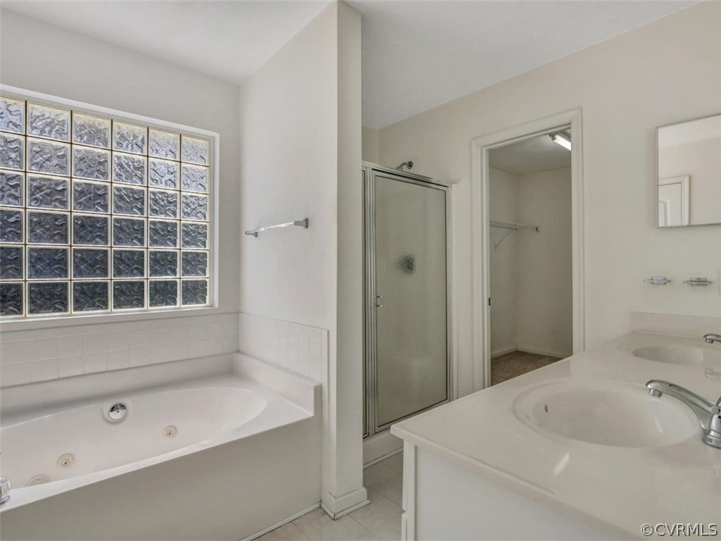 19907 Ivan Road Petersburg, VA 23803 - Photo 15 of 26 a bathroom with a sink a toilet and shower
