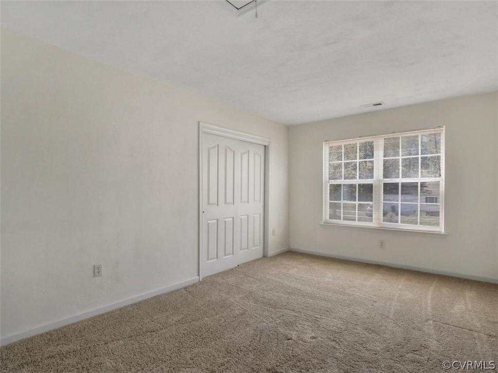 19907 Ivan Road Petersburg, VA 23803 - Photo 18 of 26 an empty room with a window