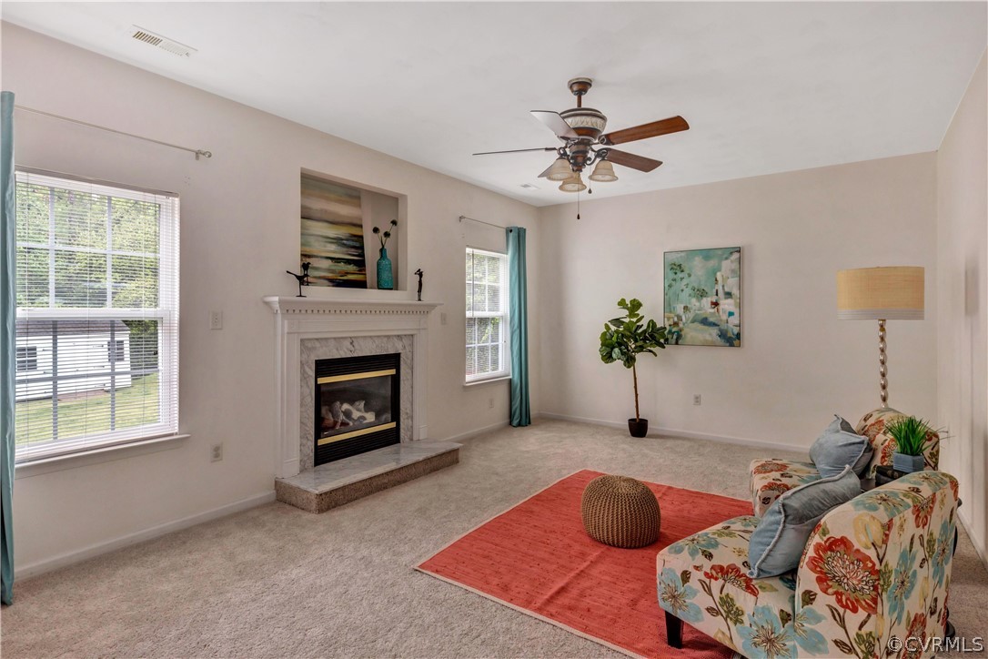 19907 Ivan Road Petersburg, VA 23803 - Photo 7 of 26 a living room with furniture and a fireplace