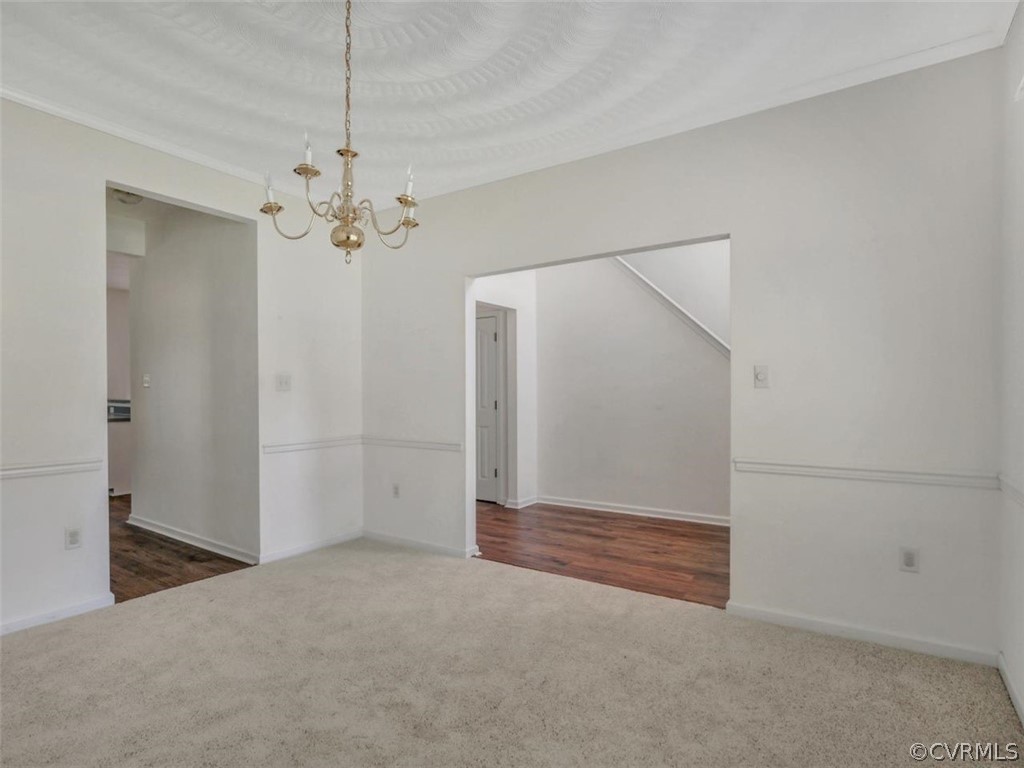 19907 Ivan Road Petersburg, VA 23803 - Photo 10 of 26 an empty room with chandelier fan and closet