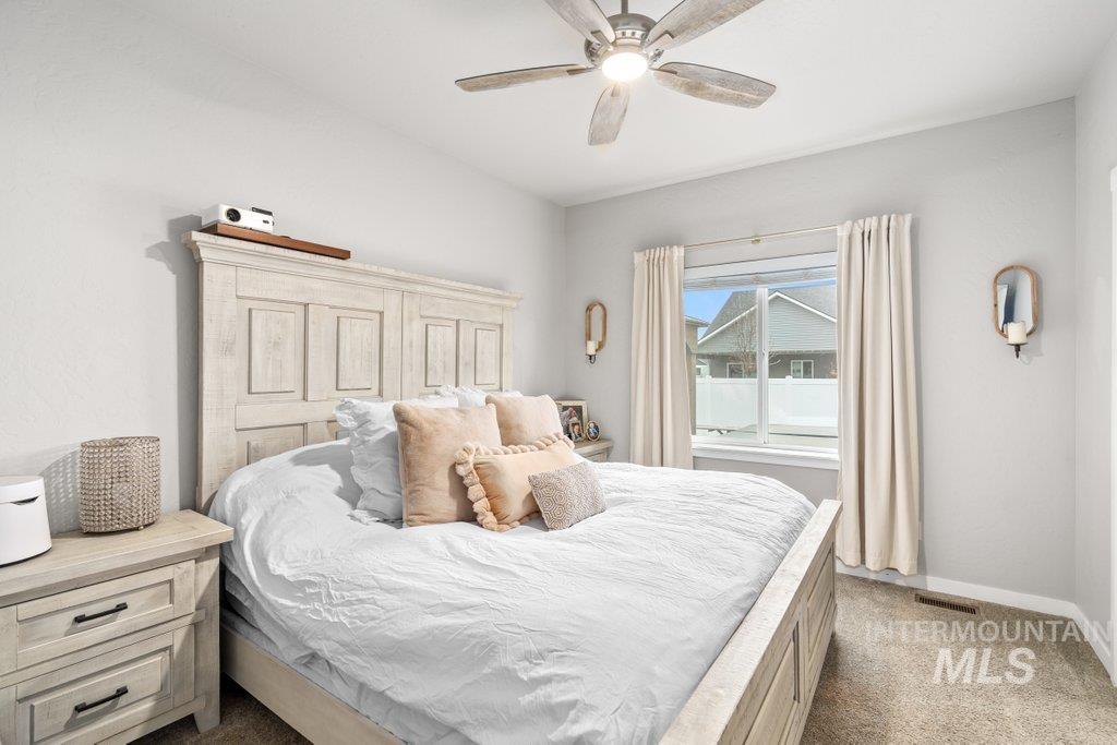 6697 West Irish Circle Rathdrum, ID 83858 - Photo 19 of 36 Bedroom with carpet and ceiling fan