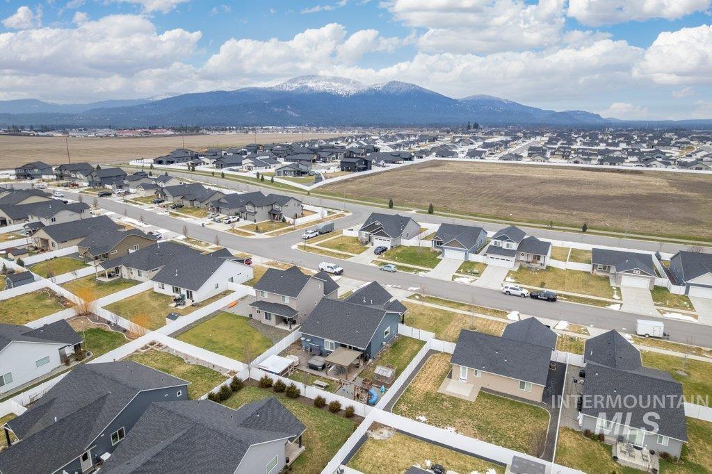 6697 West Irish Circle Rathdrum, ID 83858 - Photo 31 of 36 Aerial view of residential area with mountains