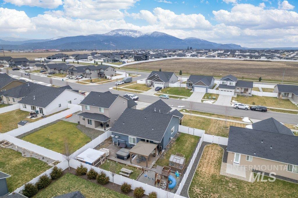 6697 West Irish Circle Rathdrum, ID 83858 - Photo 32 of 36 Aerial perspective of suburban area with a mountainous background
