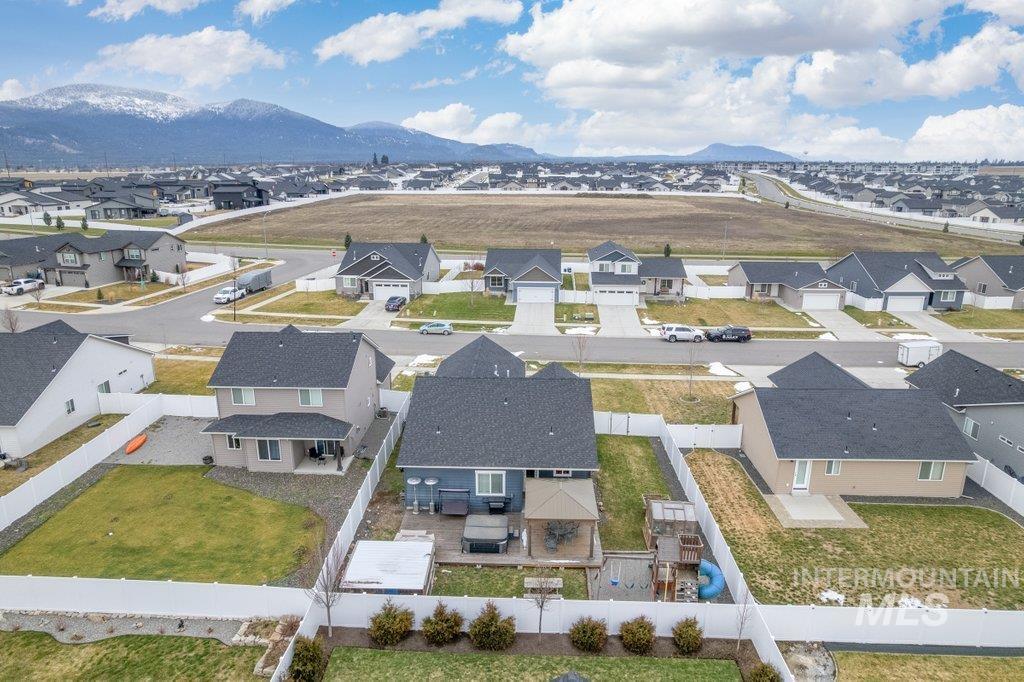 6697 West Irish Circle Rathdrum, ID 83858 - Photo 33 of 36 Aerial perspective of suburban area with a mountain backdrop