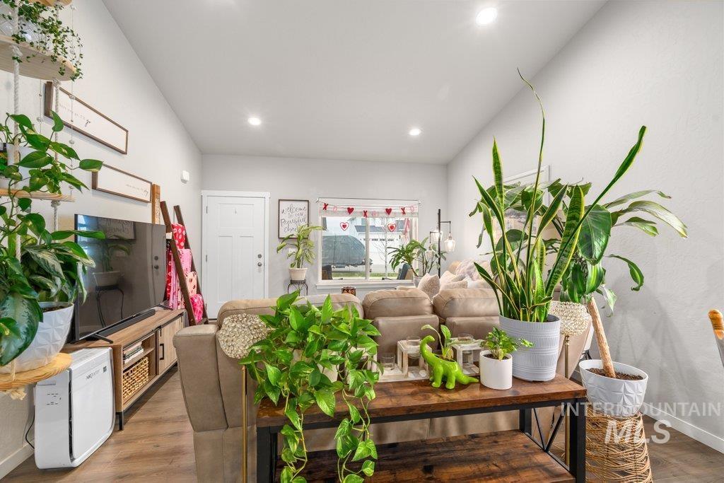 6697 West Irish Circle Rathdrum, ID 83858 - Photo 4 of 36 Living area with wood finished floors and recessed lighting