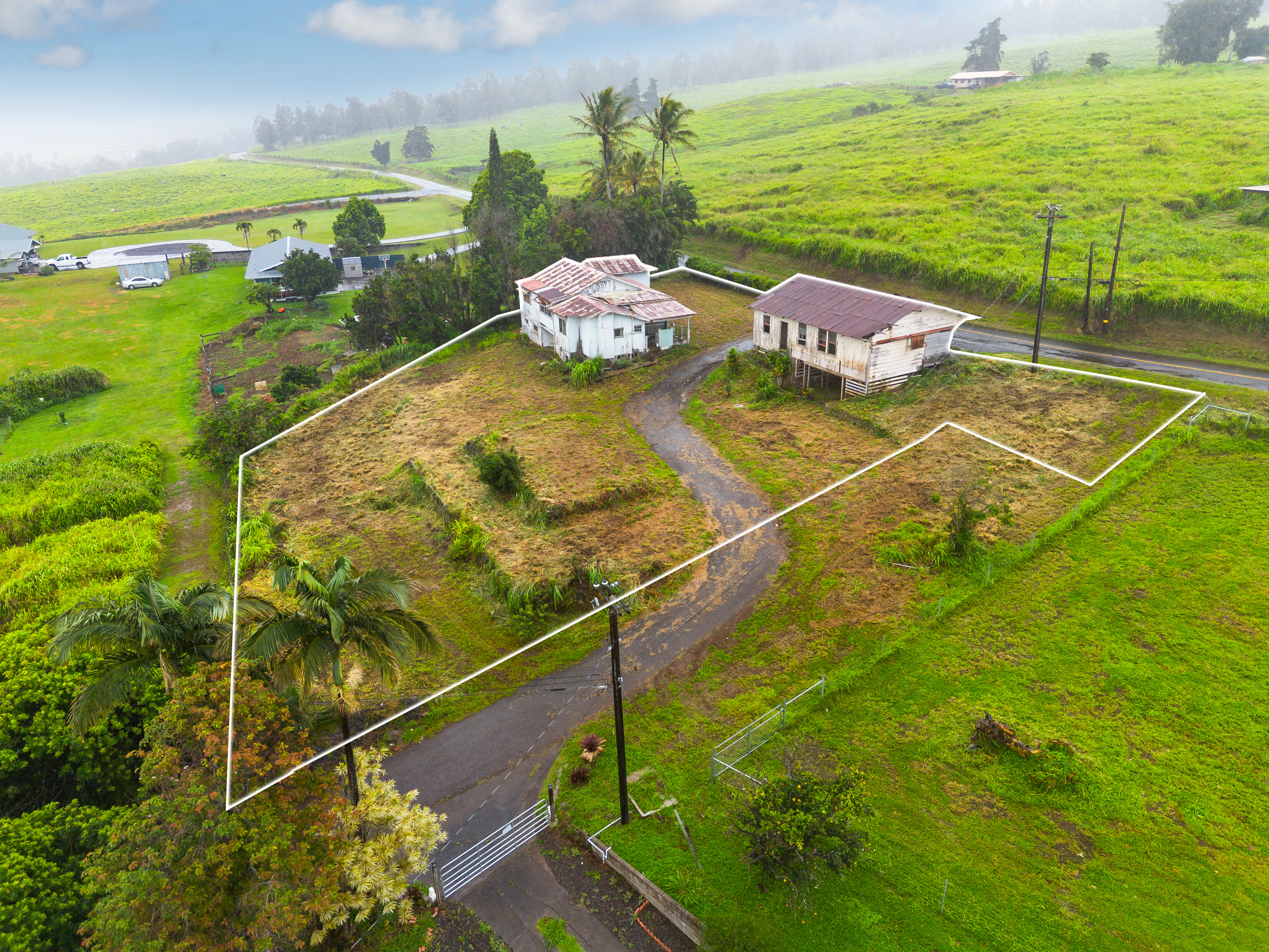 44-2906 Kalopa Road Honokaa, HI 96727 - Photo 1 of 29 a view of a swimming pool with an ocean view