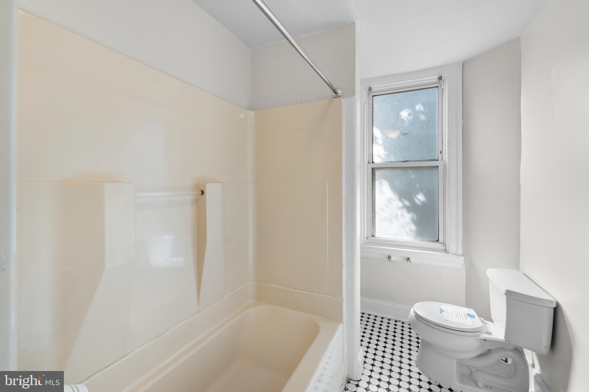 421 Mechanic Street Philadelphia, PA 19144 - Photo 17 of 20 a bathroom with a toilet and a shower