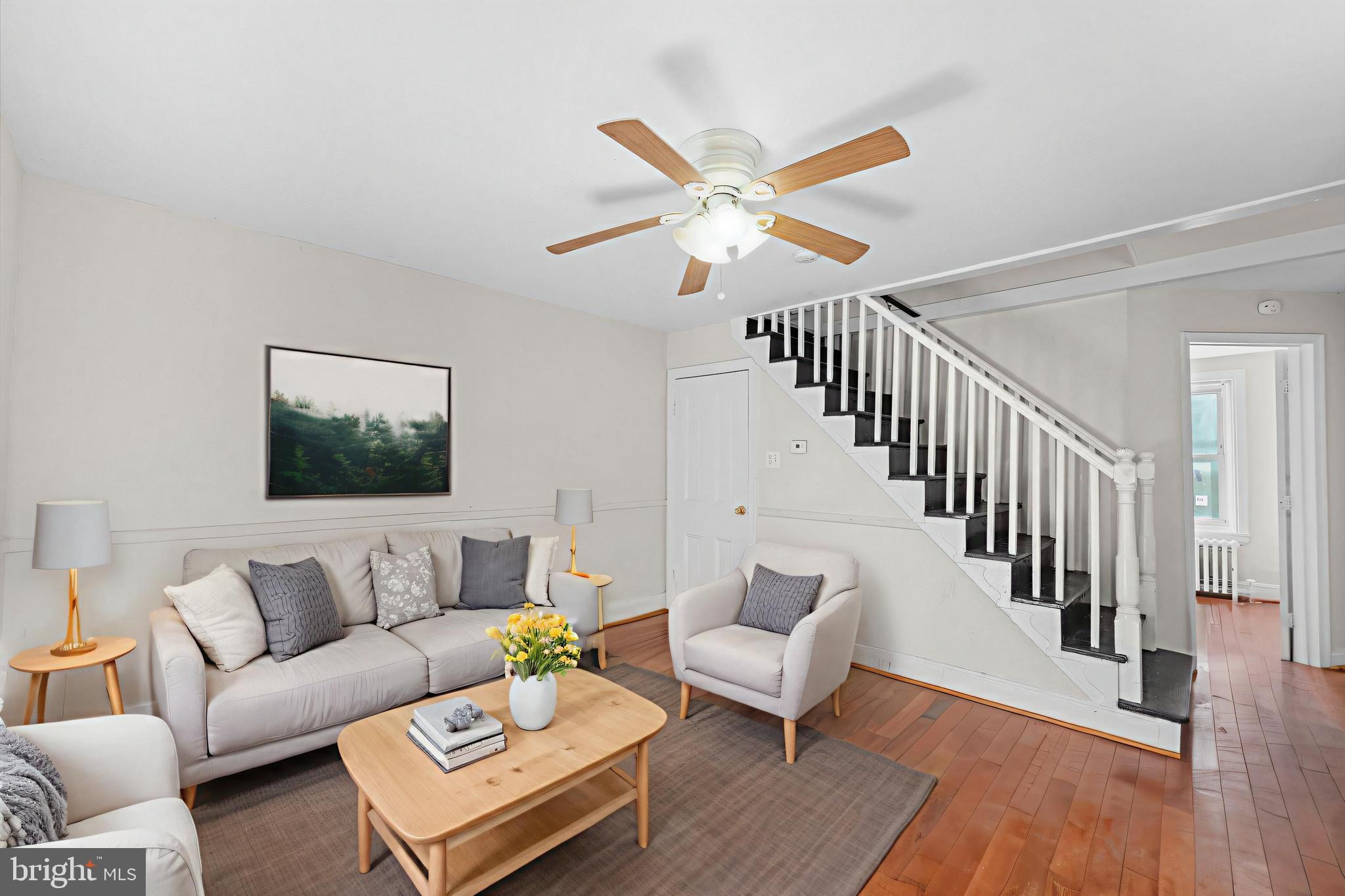 421 Mechanic Street Philadelphia, PA 19144 - Photo 2 of 20 a living room with furniture and a wooden floor