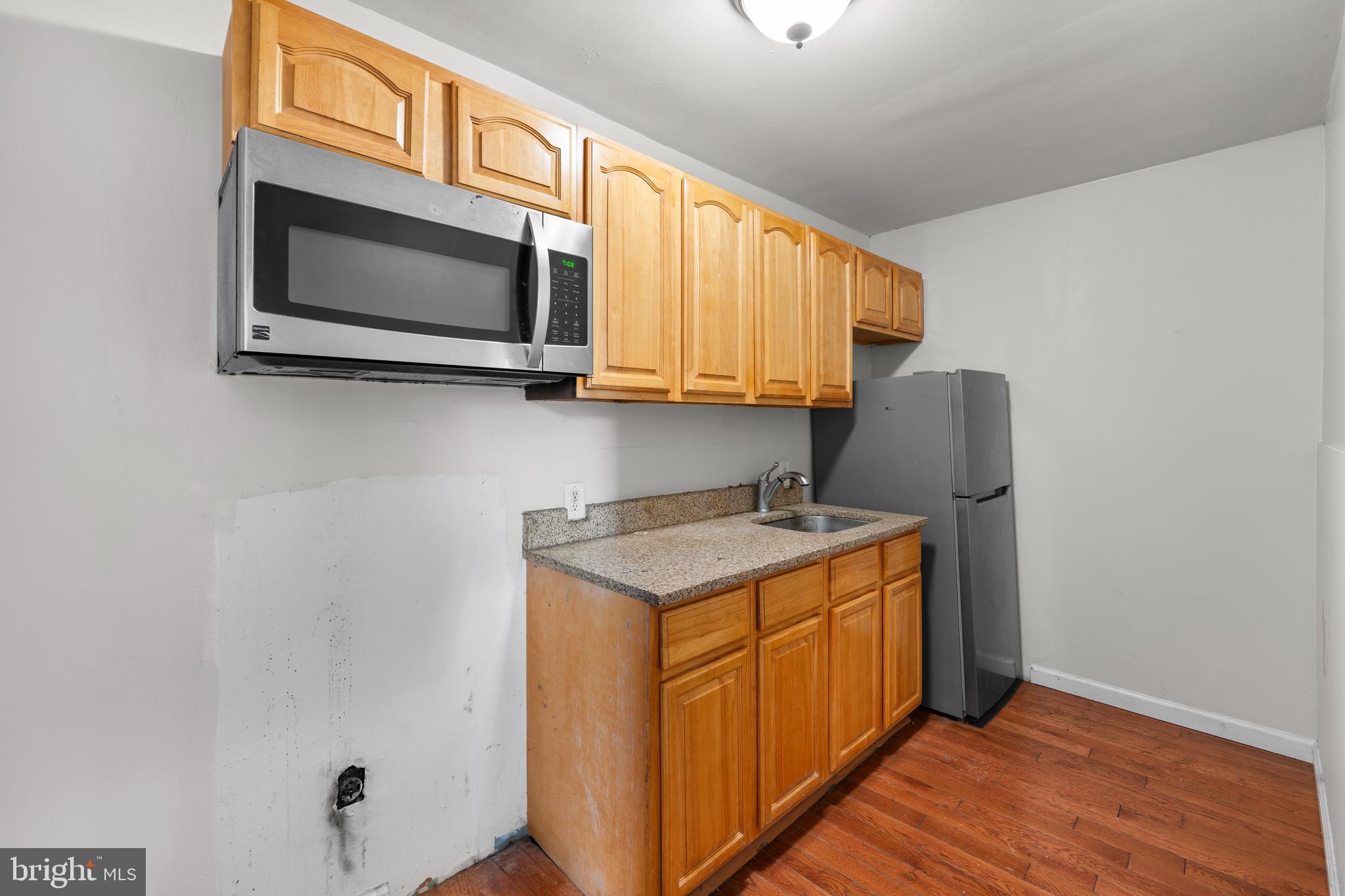 421 Mechanic Street Philadelphia, PA 19144 - Photo 4 of 20 a utility room with wooden floor washer and dryer