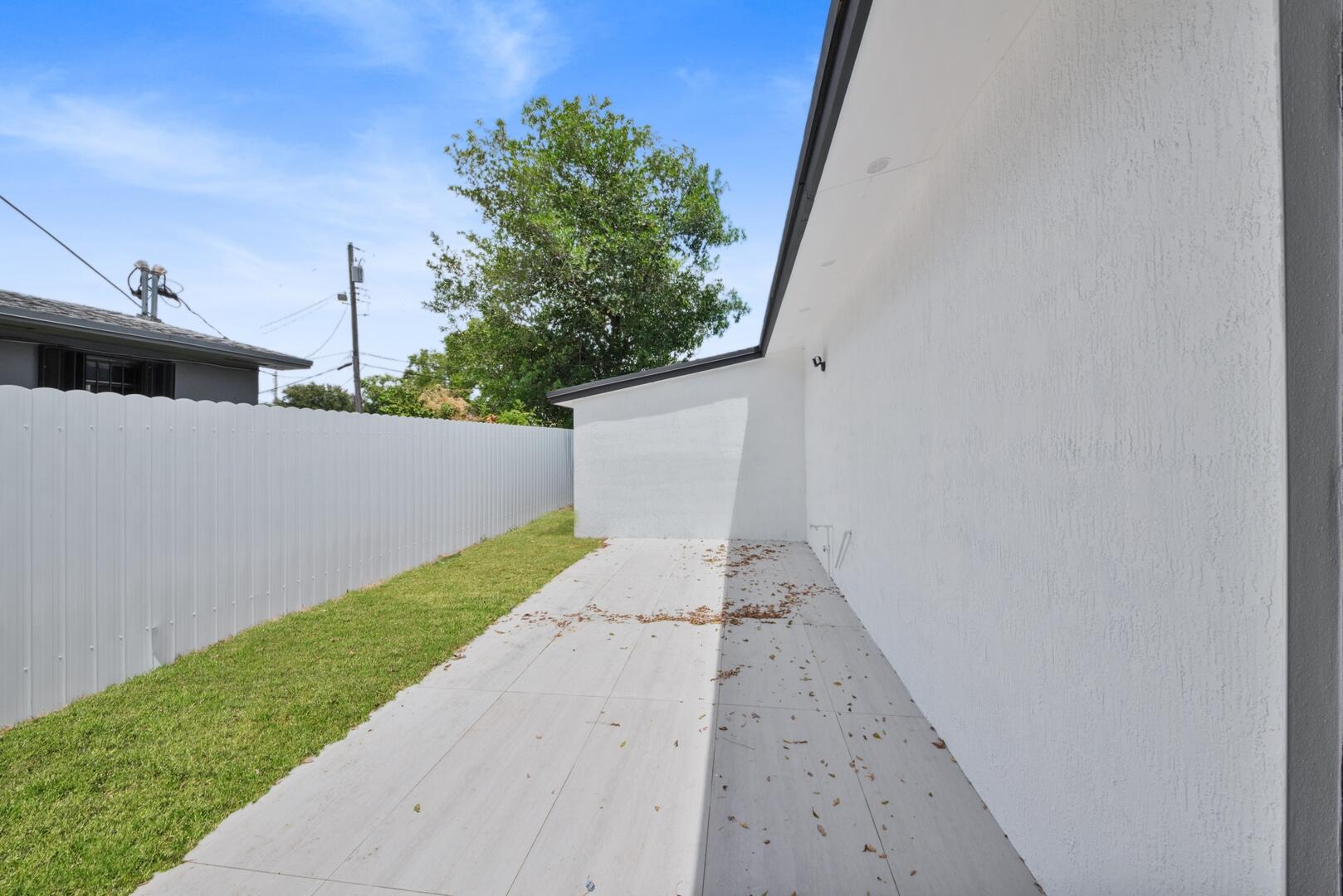 860 Northwest 70th Street Miami, FL 33150 - Photo 16 of 25 a view of a backyard